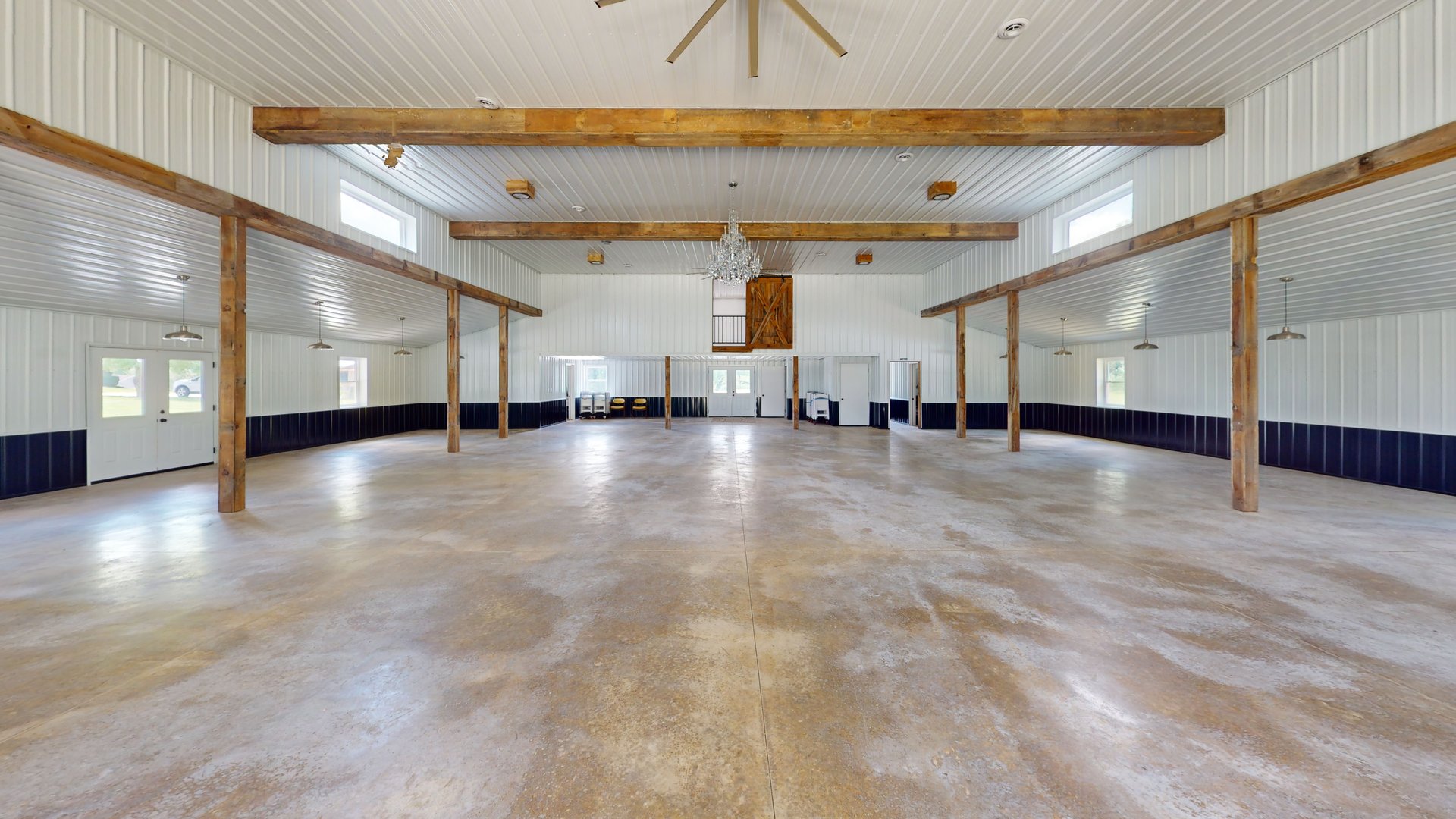 Matterport 360° virtual tour of a barn interior — press play, then click to walk through.